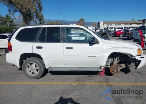 2003 GMC Envoy Sle z USA, uszkodzony, nr VIN 1GKDS13S132357358